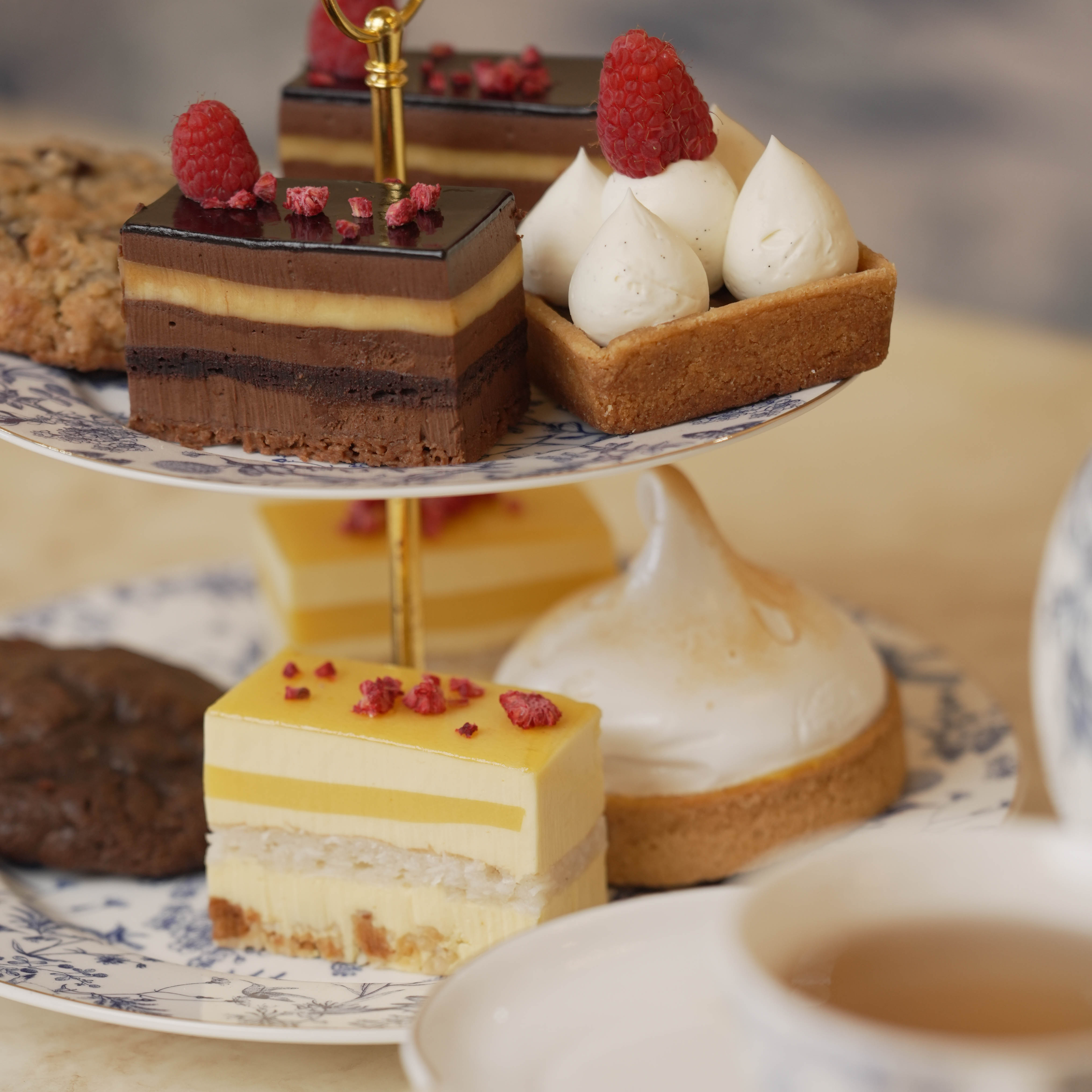 High tea cakes on the table at Monaco's Cafe