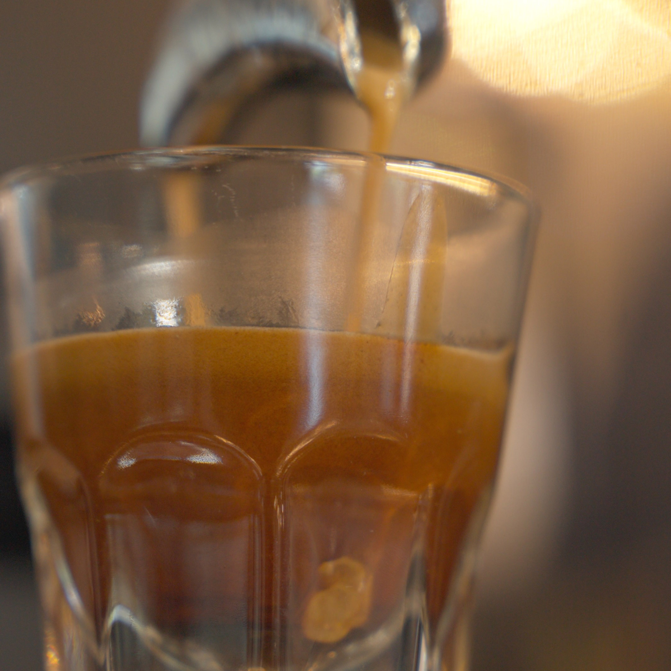 Tea poured into a glass at Monaco's Cafe